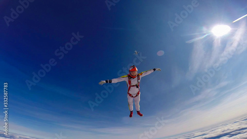 Protection. Professional equipment protects the skydiver during the flight. Bird eye height. © Viktor