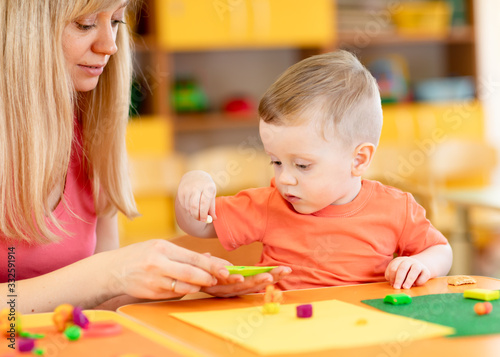 child kid boy and mother pl...