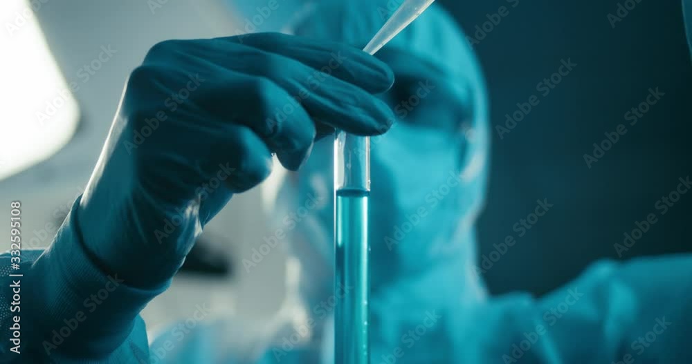 Scientist examining sample in laboratory