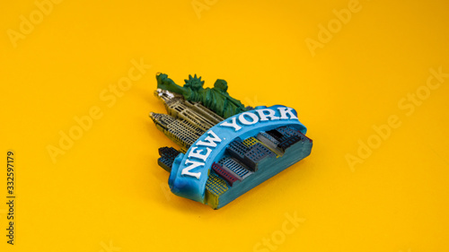 Photography New york magnet on yellow background , statue of liberty, travel concept