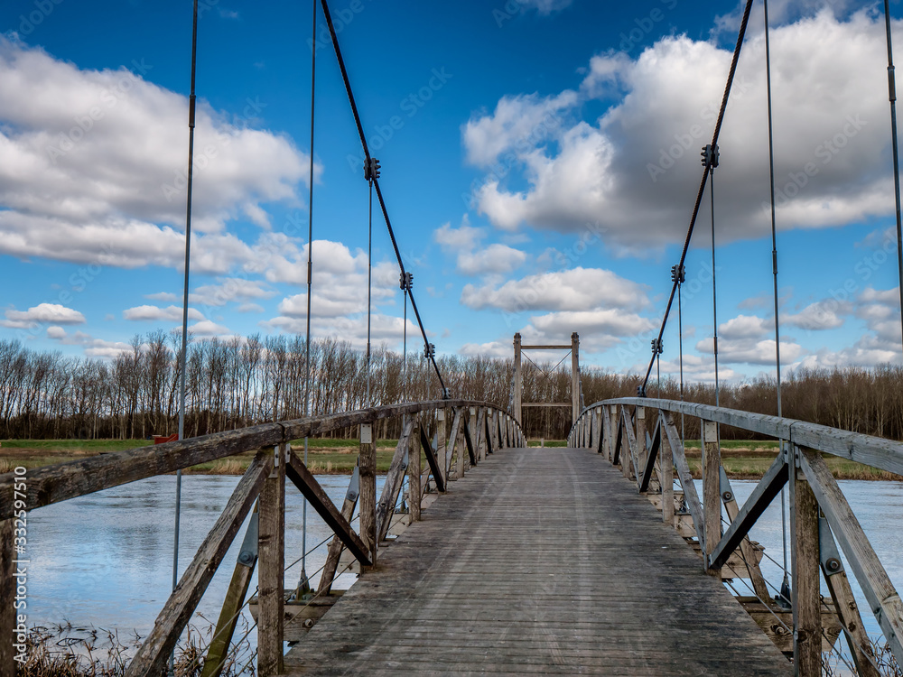 Kong Hans suspension  bridge in Skjern meadows Ringkoebing, Denmark