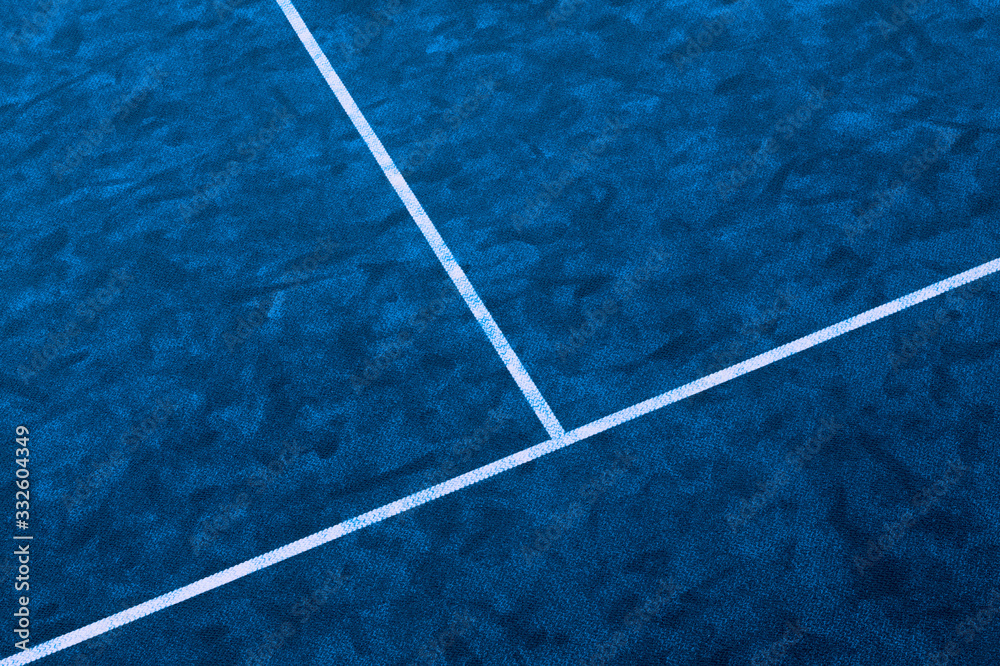 Tennis court indoor with carpet surface. Blue filter