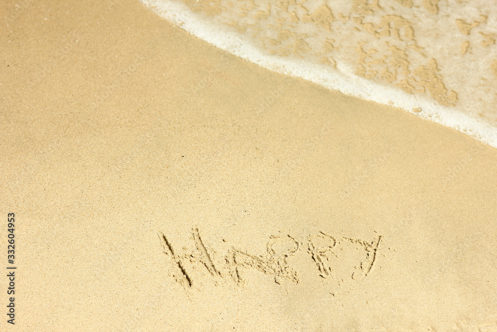 Fototapeta premium holiday inscription on the beach