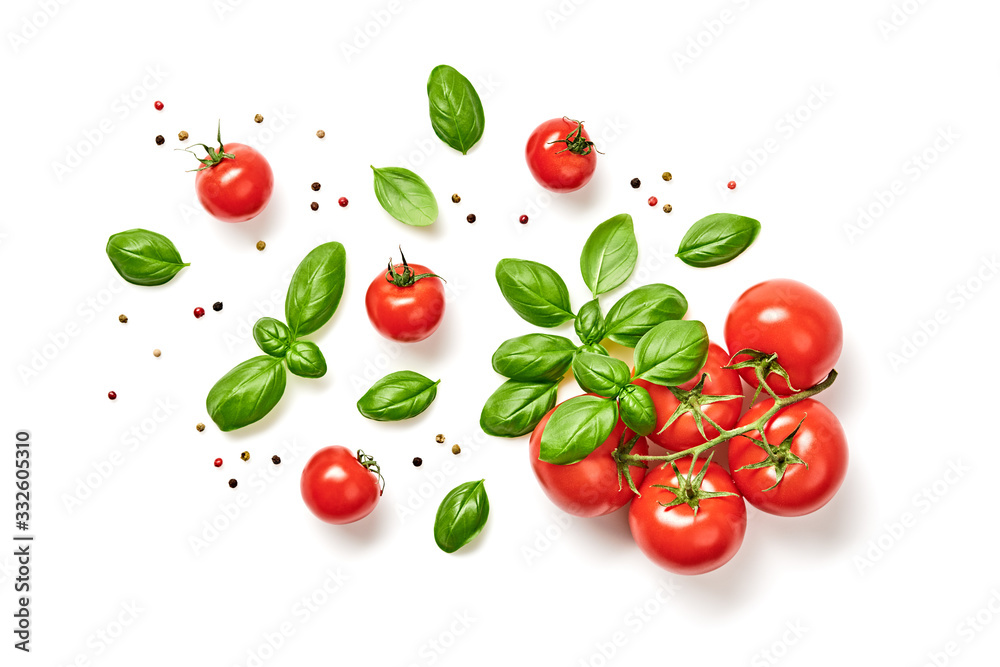 Fototapeta Tomato, basil, spices, pepper, garlic. Vegan diet food, creative cherry tomato composition isolated on white. Fresh basil, herb, tomatoes, cooking concept, top view.