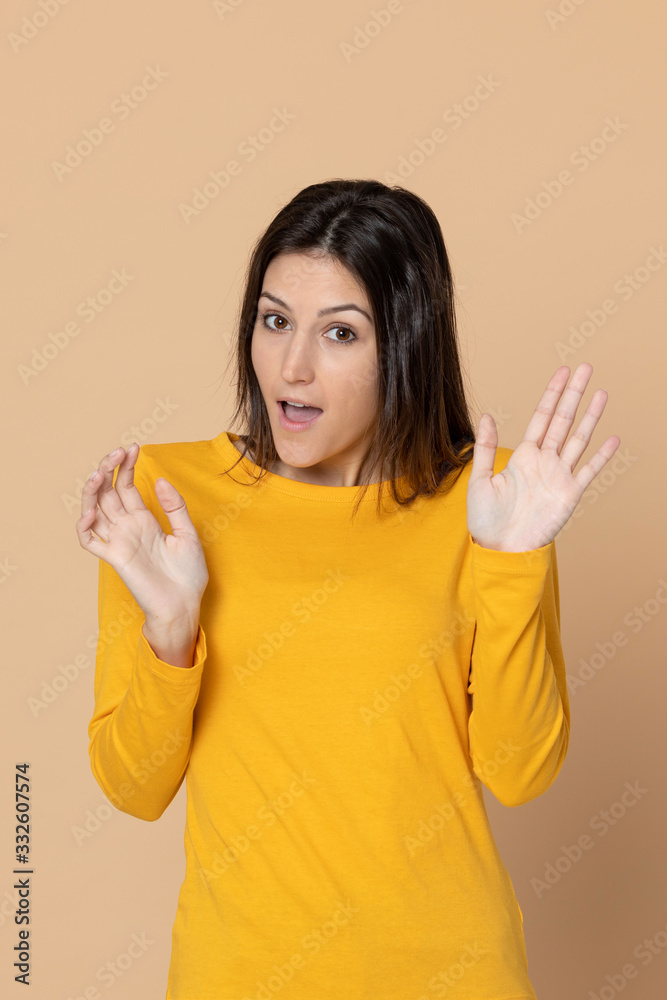 Attractive young girl wearing a yellow T-shirt Attractive young girl wearing a yellow T-shirt