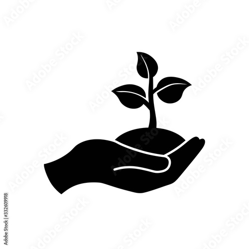 Hand holding seedlings with leaves or palm with sprout, ecology icon in black on an isolated white background. EPS 10 vector