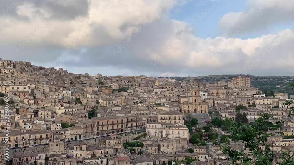 Modica time lapse at sunset with light effects on the city 2 Modica time lapse at sunset with light effects on the city 2
