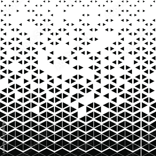 Vector halftone of black triangle on white background