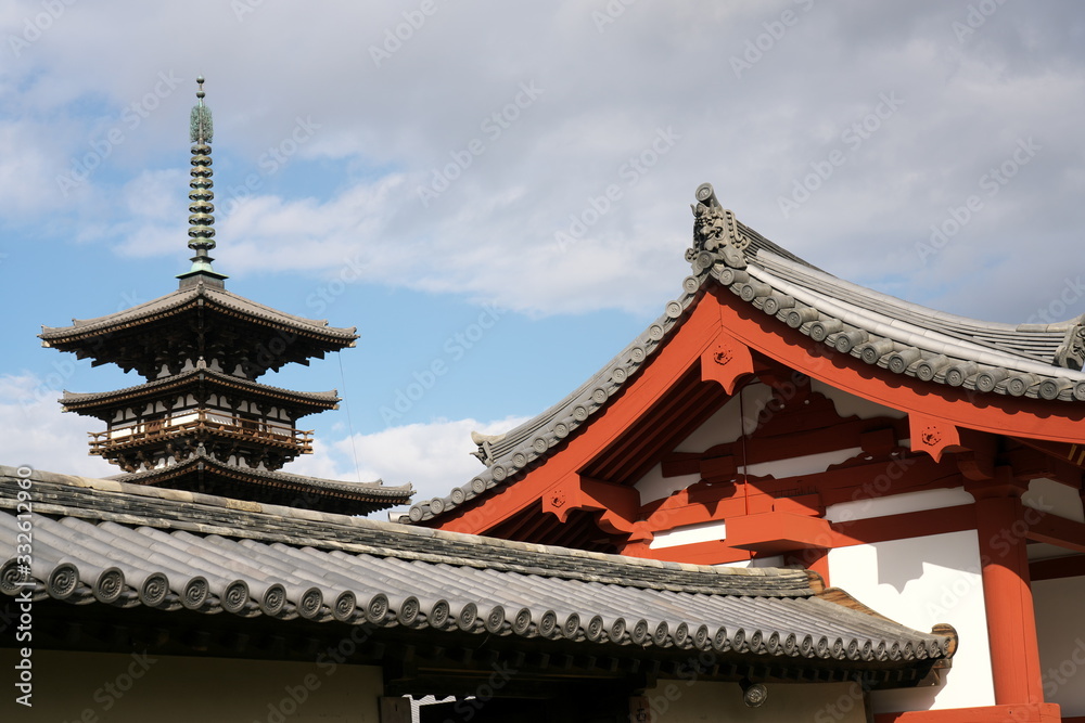 Nara,Japan-February 23, 2020: View of Yakushiji temple East Pagoda just after the restoration from the road adjacent to the temple Nara,Japan-February 23, 2020: View of Yakushiji temple East Pagoda just after the restoration from the road adjacent to the temple