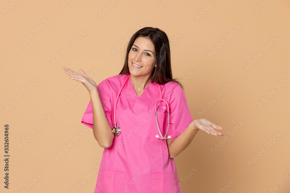 Young doctor wearing pink uniform