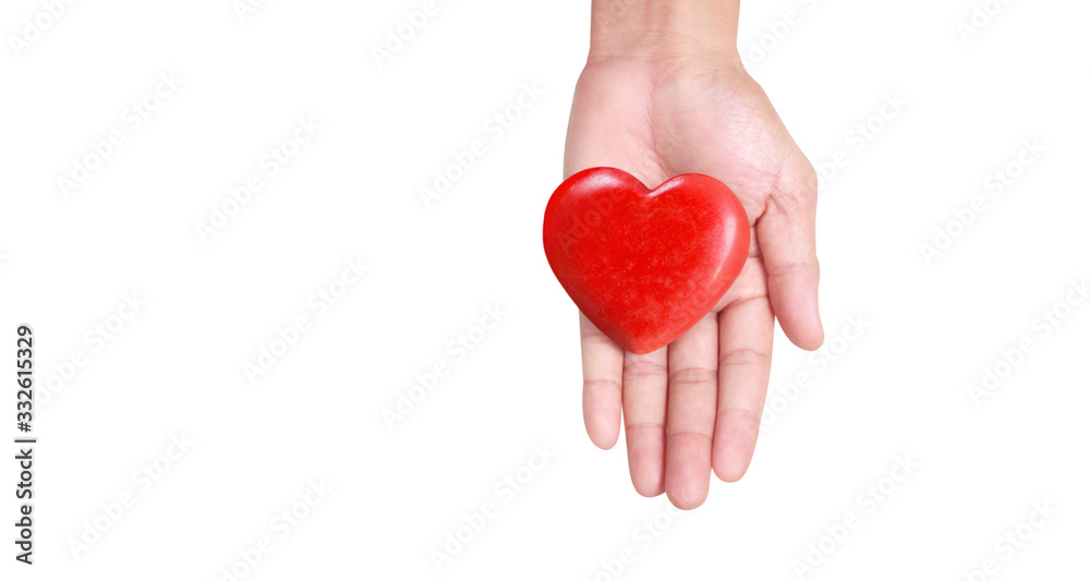 Hands holding a red heart. and donation concepts Hands holding a red heart. and donation concepts