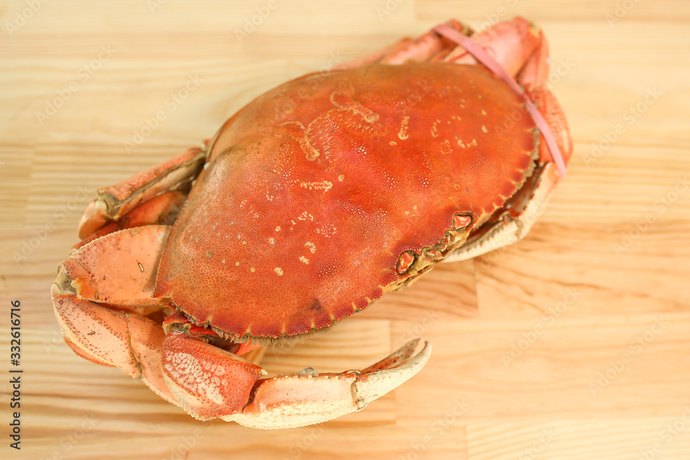 big crab, huge crab, seafood, delicacies, on wooden background big crab, huge crab, seafood, delicacies, on wooden background
