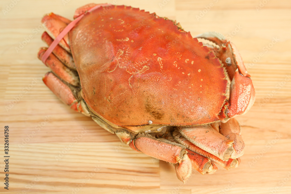 big crab, huge crab, seafood, delicacies, on wooden background big crab, huge crab, seafood, delicacies, on wooden background