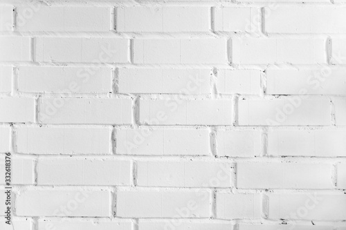 White brick wall with shadows 