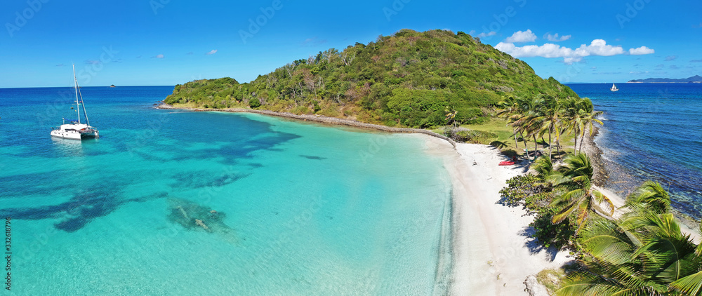 Caribbean Grenadines Mayreau tropical island beach, panoramic aerial view of Salt Whistle Bay
