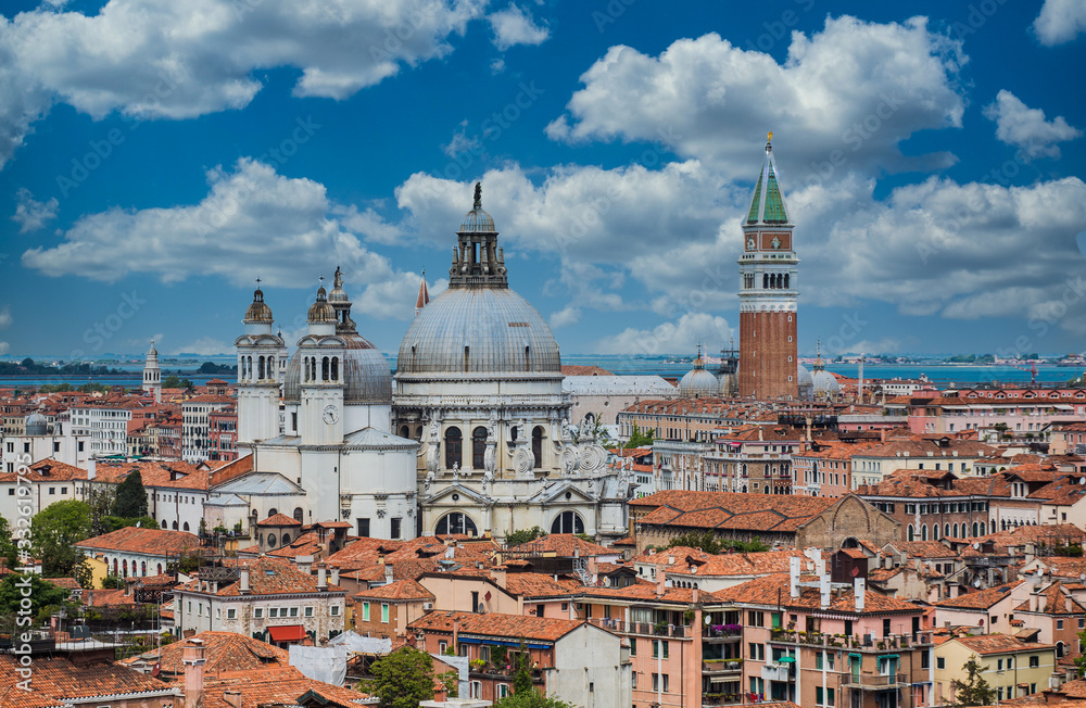 Tile rooftops and church domes across Venice skyline