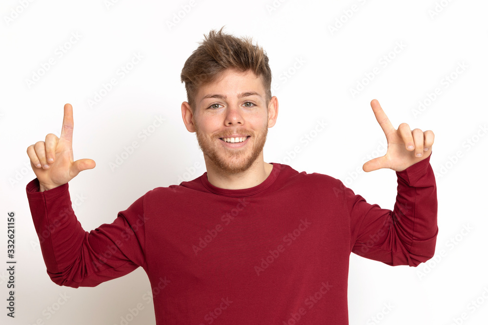 Attractive young guy with a red T-shirt Attractive young guy with a red T-shirt