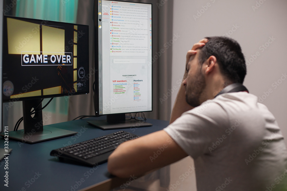 Man covering his face after game over Man covering his face after game over