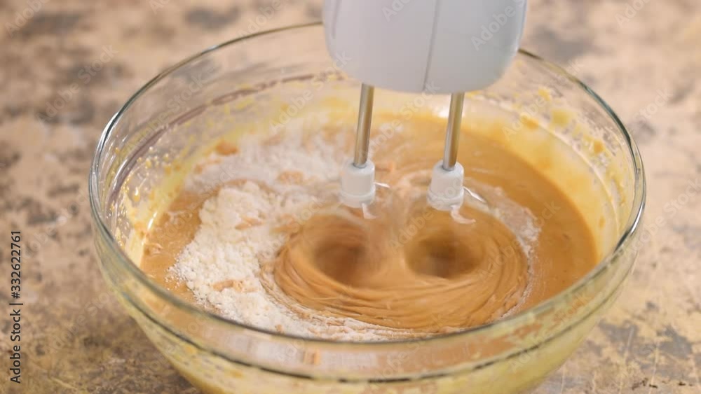 Mixing Baking Ingredients In A Bowl For Cake. Mixing Baking Ingredients In A Bowl For Cake.