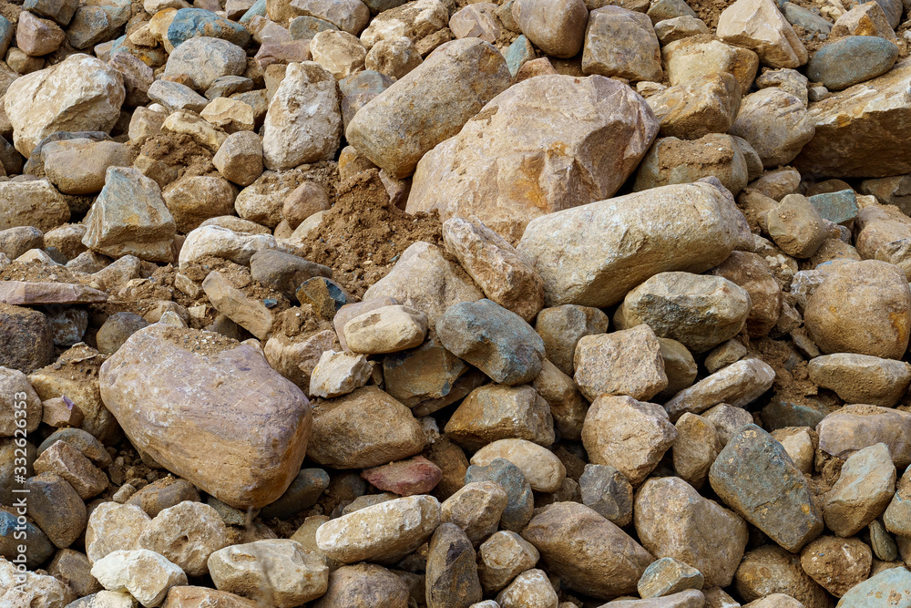pile of cobblestones with sand