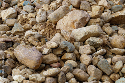 Obraz na płótnie pile of cobblestones with sand w salonie