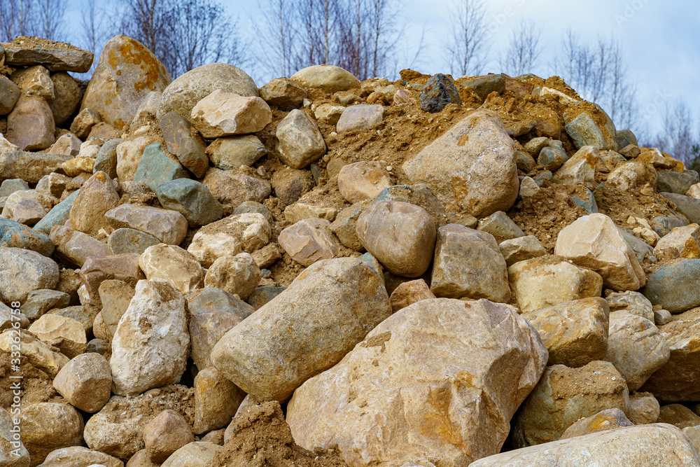 pile of cobblestones with sand