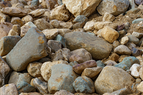 pile of cobblestones with sand