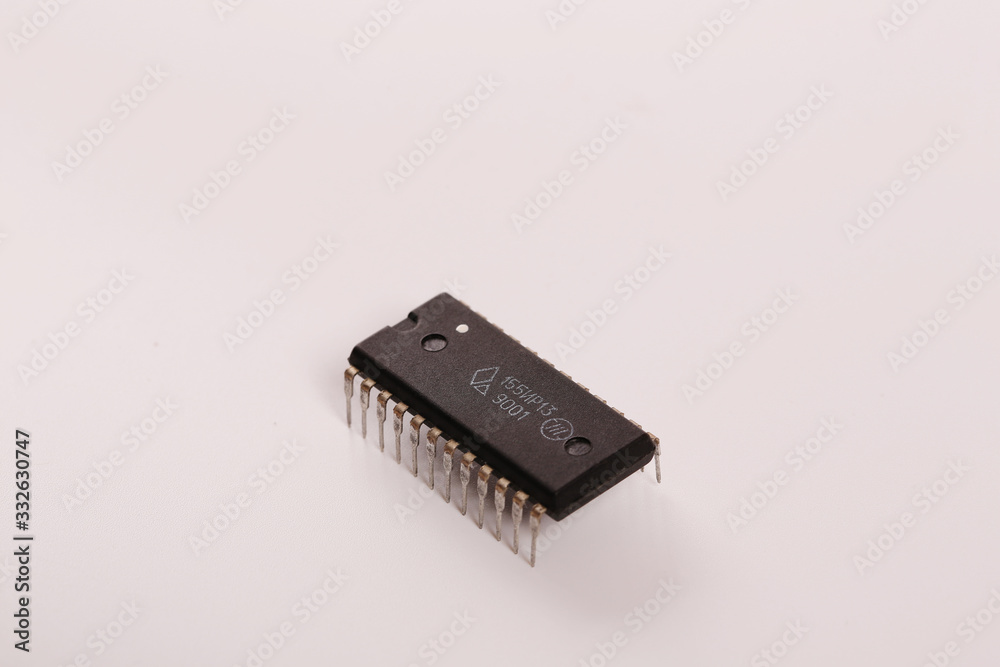 Microcircuit isolated on a white background. Close-up. Microcircuit isolated on a white background. Close-up.