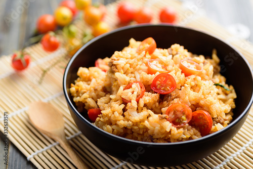 Fried rice with minced pork and tomato in a bowl, Asian food
