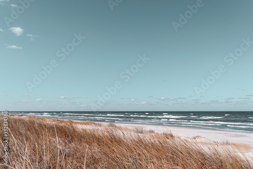Fototapeta Naklejka Na Ścianę i Meble -  Spring view of the beach on the Baltic Sea in Poland