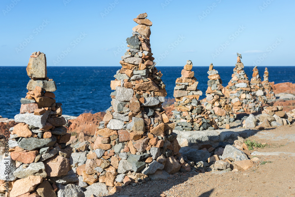 Stones Piled on Each Other near Coastline: Rocks and Cliffs near Sea Stones Piled on Each Other near Coastline: Rocks and Cliffs near Sea