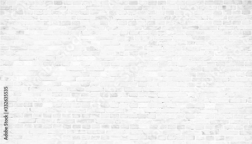 Fotografija Simple grungy white brick wall with light gray shades seamless pattern surface texture background in wide panorama banner format