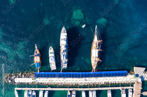 Aerial Drone top down shot of leisure boats and yachts docked in the island of Ischia, Italy © iAmTasweer