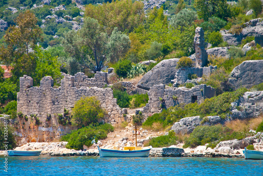View of the Mediterranean coast. Ruins of the ancient settlement. Turkey. 
