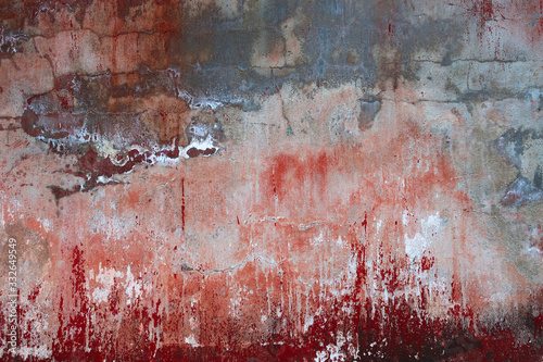 Background texture of an old concrete wall with peeling paint
