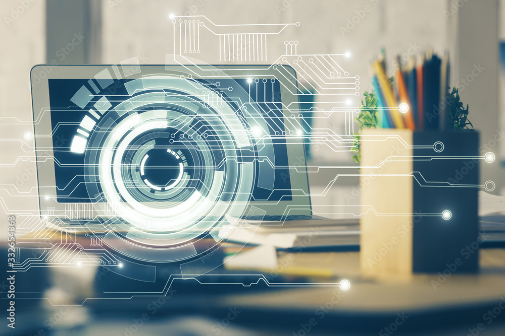 Double exposure of laptop computer and technology theme hologram. Concept of freelance work. Double exposure of laptop computer and technology theme hologram. Concept of freelance work.