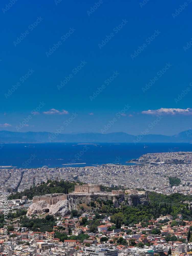 Athens Greece, panoramic view of the urban texture with Parthenon and other ancient temples on Acropolis hill