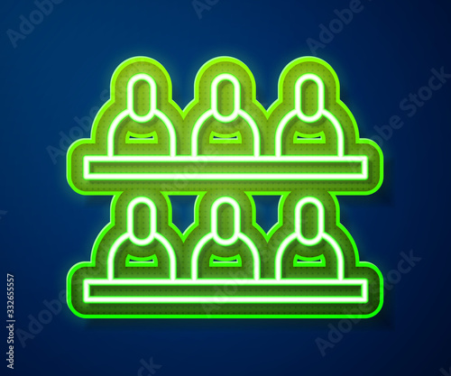 Glowing neon line Jurors icon isolated on blue background. Vector Illustration