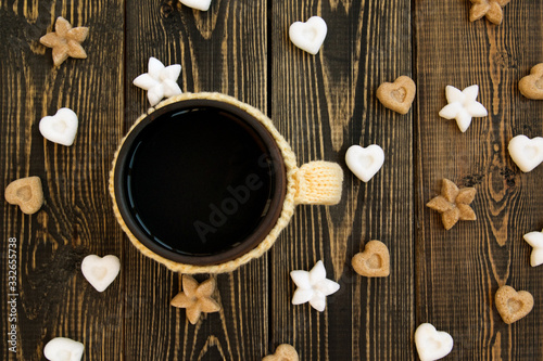 Cup of tea and sugar in form of heart and flower