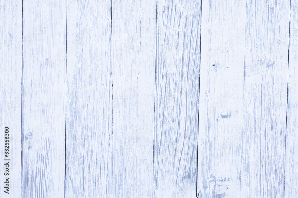 Weathered whitewash blue tint wood textured material background Weathered whitewash blue tint wood textured material background