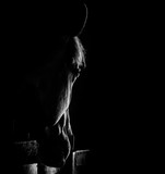 portrait in black and white os a horse head with a back light