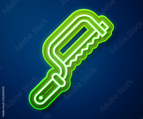 Glowing neon line Hacksaw icon isolated on blue background. Metal saw for wood and metal. Vector Illustration