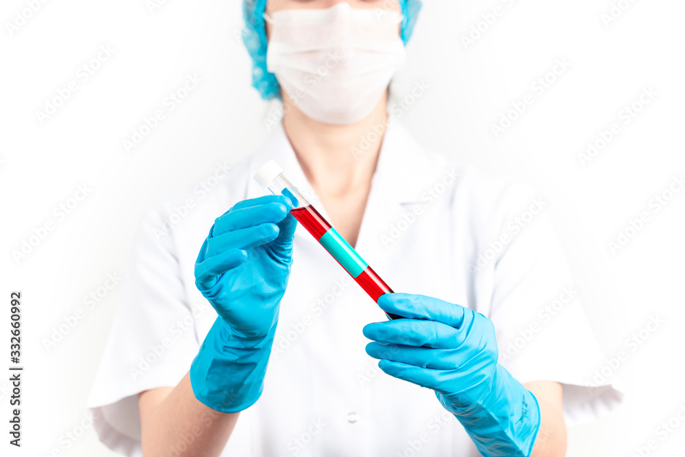young woman doctor is holding a blood test in her hand. Health concept on white background. young woman doctor is holding a blood test in her hand. Health concept on white background.