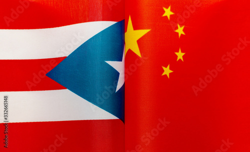 fragments of the national flags of Puerto Rico and China close up