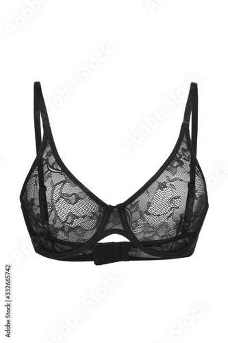 Subject shot of a black lace bra with thin straps and soft underwired cups made of a thin lace with flower tracery. The exquisite lingerie is isolated on the white background.
