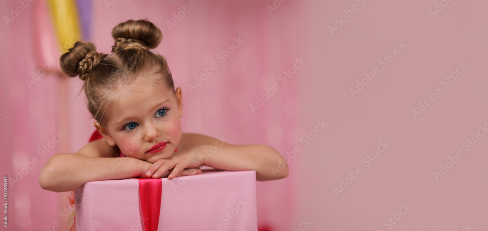 portrait of a girl-model, having fun at a birthday party in a beautiful, delicious, pink candy interior, the concept of themed children's holidays, participation in competitions. banner portrait of a girl-model, having fun at a birthday party in a beautiful, delicious, pink candy interior, the concept of themed children's holidays, participation in competitions. banner