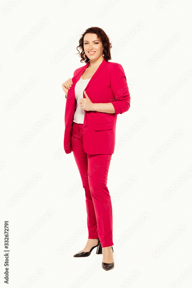 Full length of smiling business woman in red suit, isolated on white background Full length of smiling business woman in red suit, isolated on white background