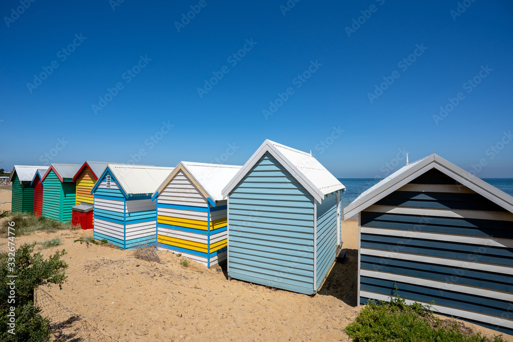 Colorful bathing boxes at Brighton beach with blue sky and sea, Melbourne, Victoria, Australia Colorful bathing boxes at Brighton beach with blue sky and sea, Melbourne, Victoria, Australia