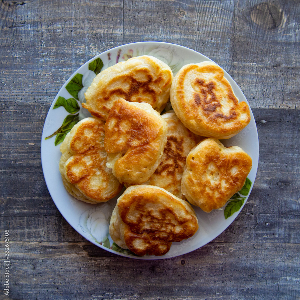 hot, fresh and flavorful pancakes on a plate hot, fresh and flavorful pancakes on a plate
