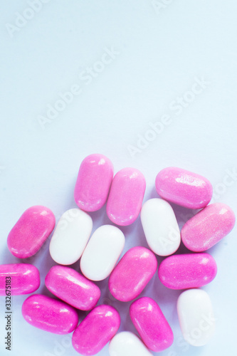 Pills multi-colored macro. Coronavirus vaccine concept. Healthcare